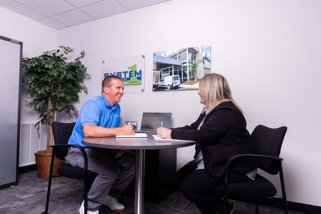 system1 staff talking with each other